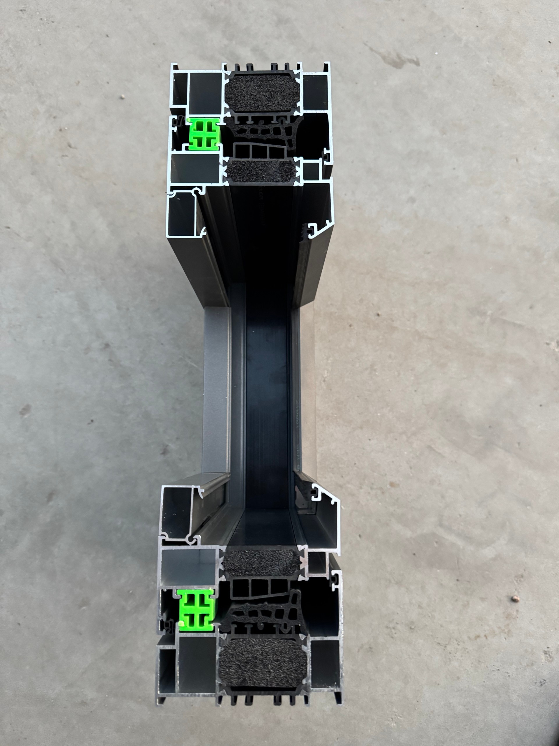 What are the advantages of the 6063-T5 aluminum alloy used as the profile material for the FG110F double inward-opening thermal break window?